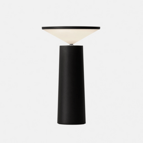 Black table lamp on a gray backround