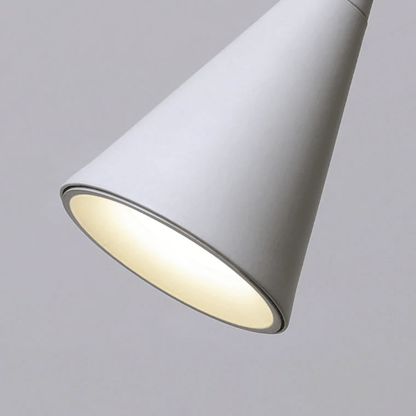 Conical lampshade with a light gray finish on a neutral background