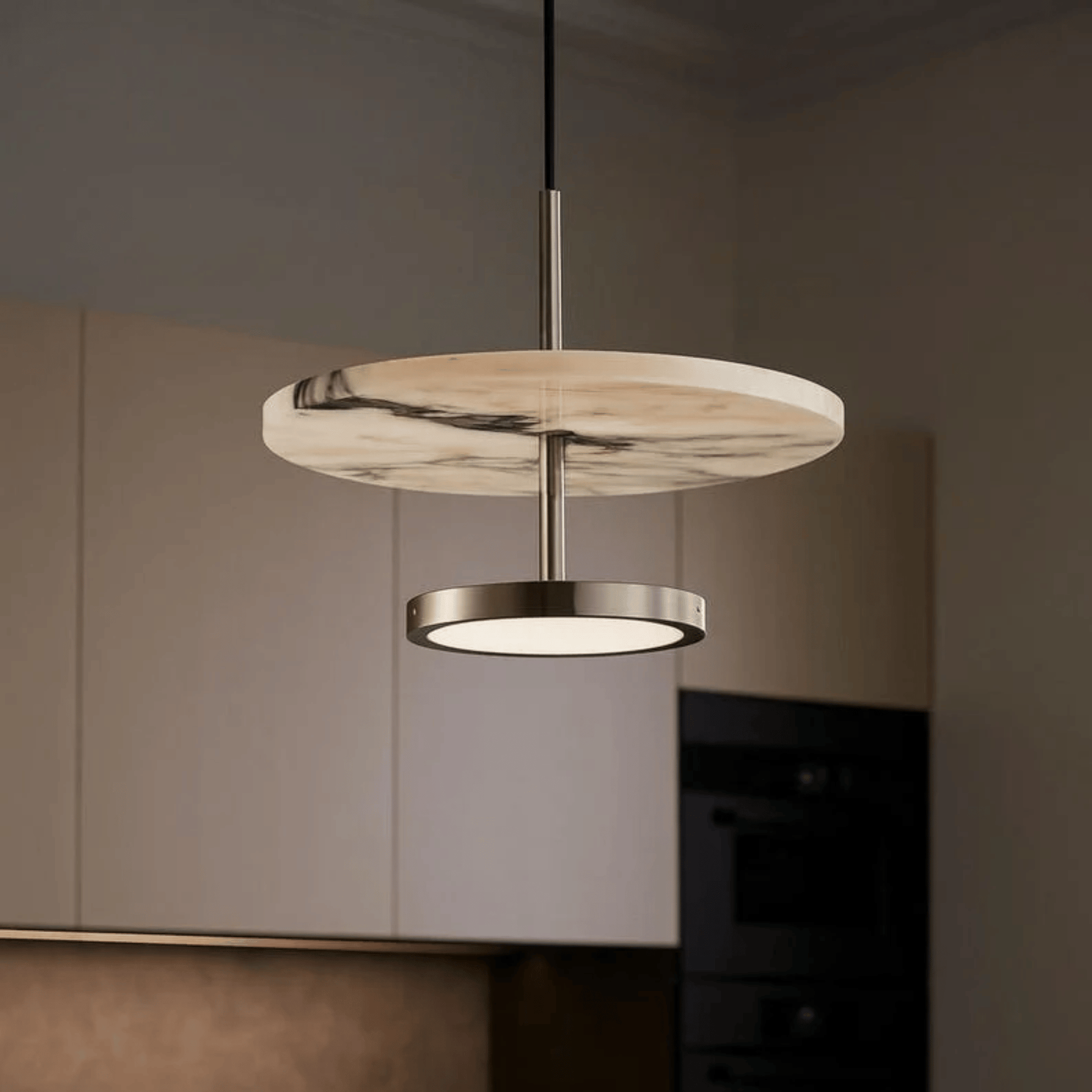 Modern pendant light with marble-like design in a kitchen setting