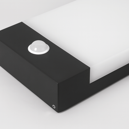 Black rectangular light fixture on a white background