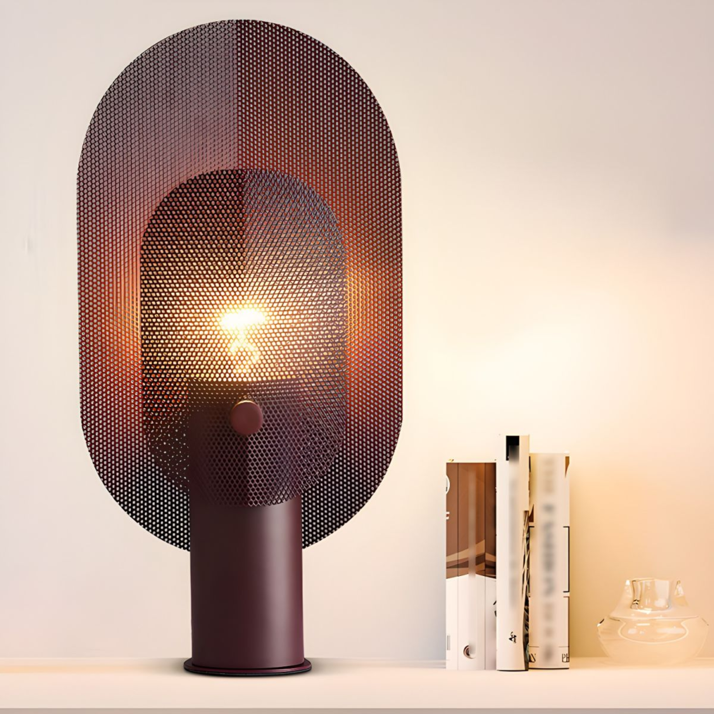 Modern table lamp with a perforated design on a neutral background