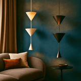 Modern living room with geometric pendant lights and a brown sofa.