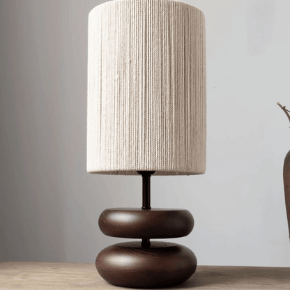 walnut wood base Table lamp on a wooden table 