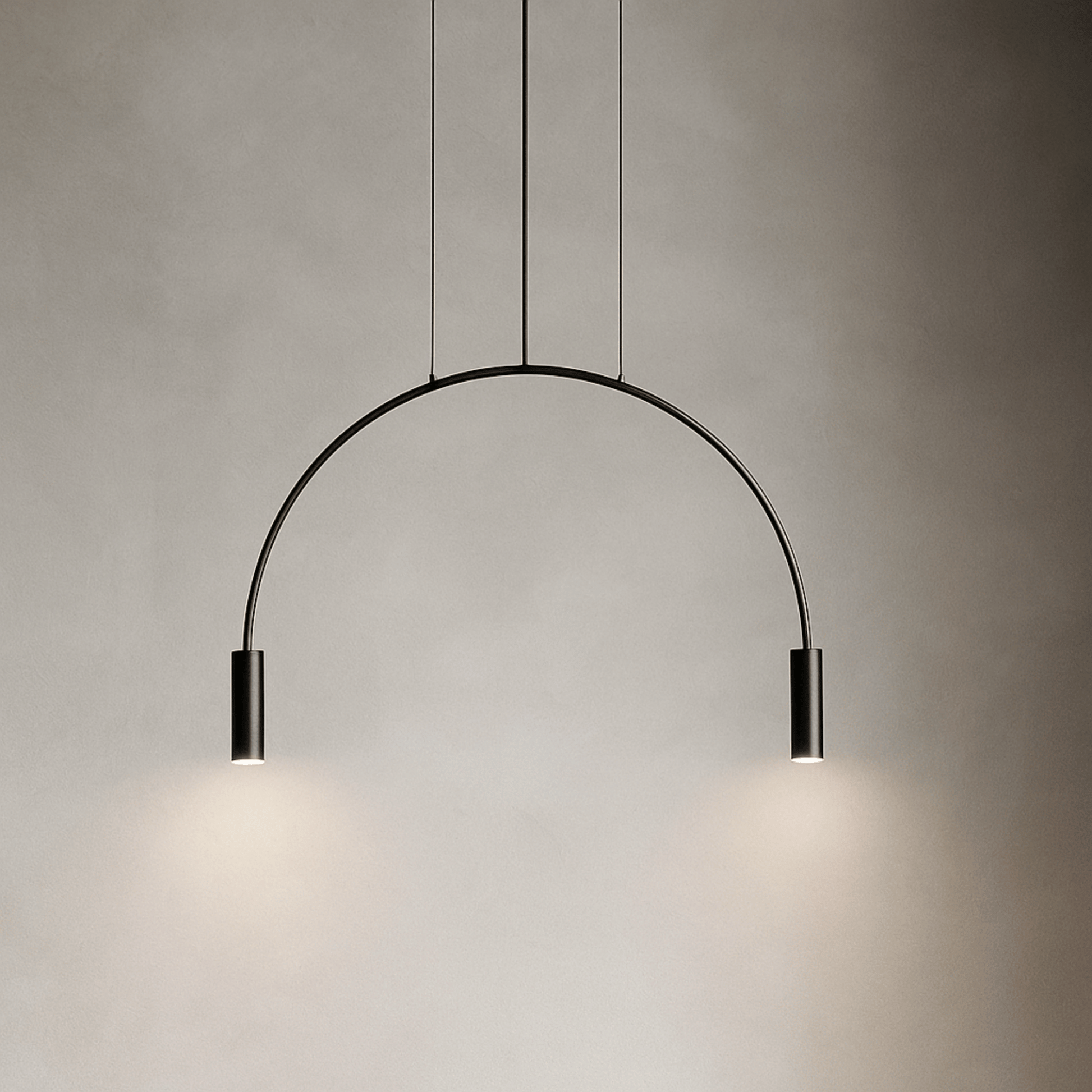 Modern pendant light with a curved design on a neutral background