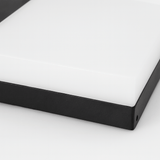 Close-up of a black frame corner on a white background