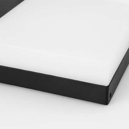 Close-up of a black frame corner on a white background