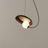 Close-up of the Black MagnoGlow Magnetic Pendant Light showing iron texture and craftsmanship