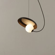 Close-up of the Black MagnoGlow Magnetic Pendant Light showing iron texture and craftsmanship