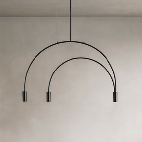 Modern black pendant light fixture on a neutral background