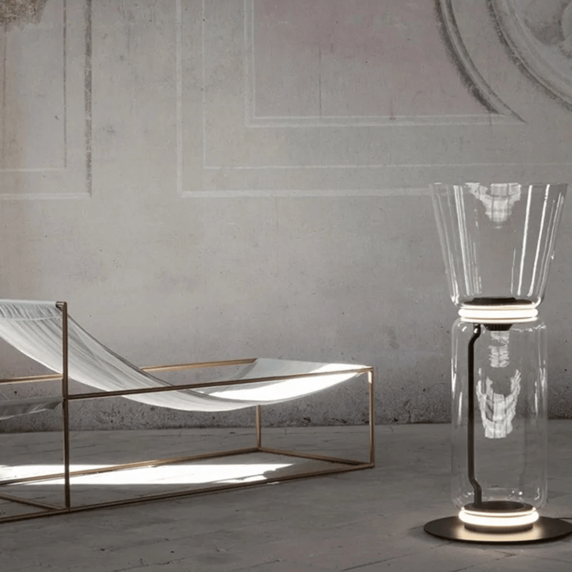 Modern glass table with a geometric design in a minimalistic setting