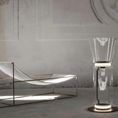 Modern glass table with a geometric design in a minimalistic setting