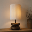 walnut wood base Table lamp on a wooden table