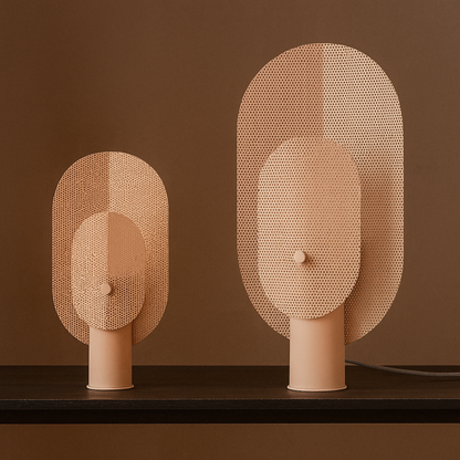 Two decorative wall lights with mesh design on a brown background