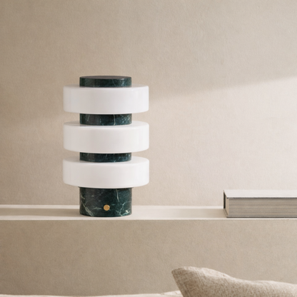 Marble cylindrical lamp on a neutral background