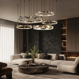 Modern living room with stylish furniture and lighting fixtures.