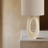Close look ofModern Toki Glow Table Lamp combines artistic design with functionality, making it a perfect addition to your bedroom or living room. Featuring an LED E27 bulb, it provides warm, inviting light while enhancing your decor.