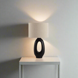 Modern Toki Glow Table Lamp combines artistic design with functionality, making it a perfect addition to your bedroom or living room. Black & Beige