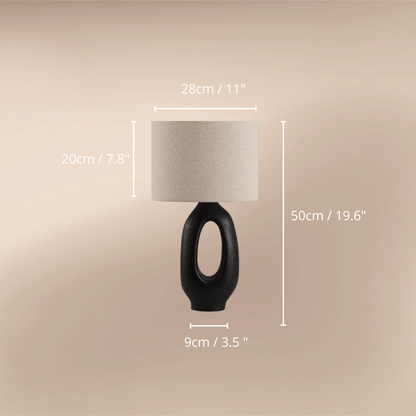 Modern Wabi-sabi table lamp combines artistic design with functionality, making it a perfect addition to your bedroom or living room. Black & Beige