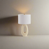 Modern Toki Glow Table Lamp combines artistic design with functionality, making it a perfect addition to your bedroom or living room.Beige & White