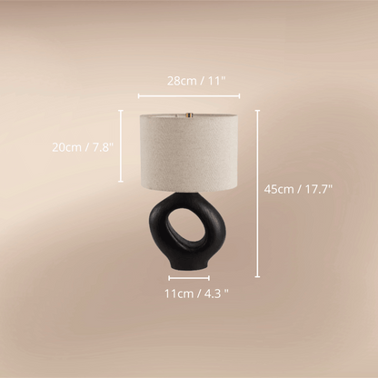 Modern Wabi-sabi table lamp combines artistic design with functionality, making it a perfect addition to your bedroom or living room. Black & Beige