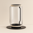 Modern glass table lamp with black base and accents on a beige background