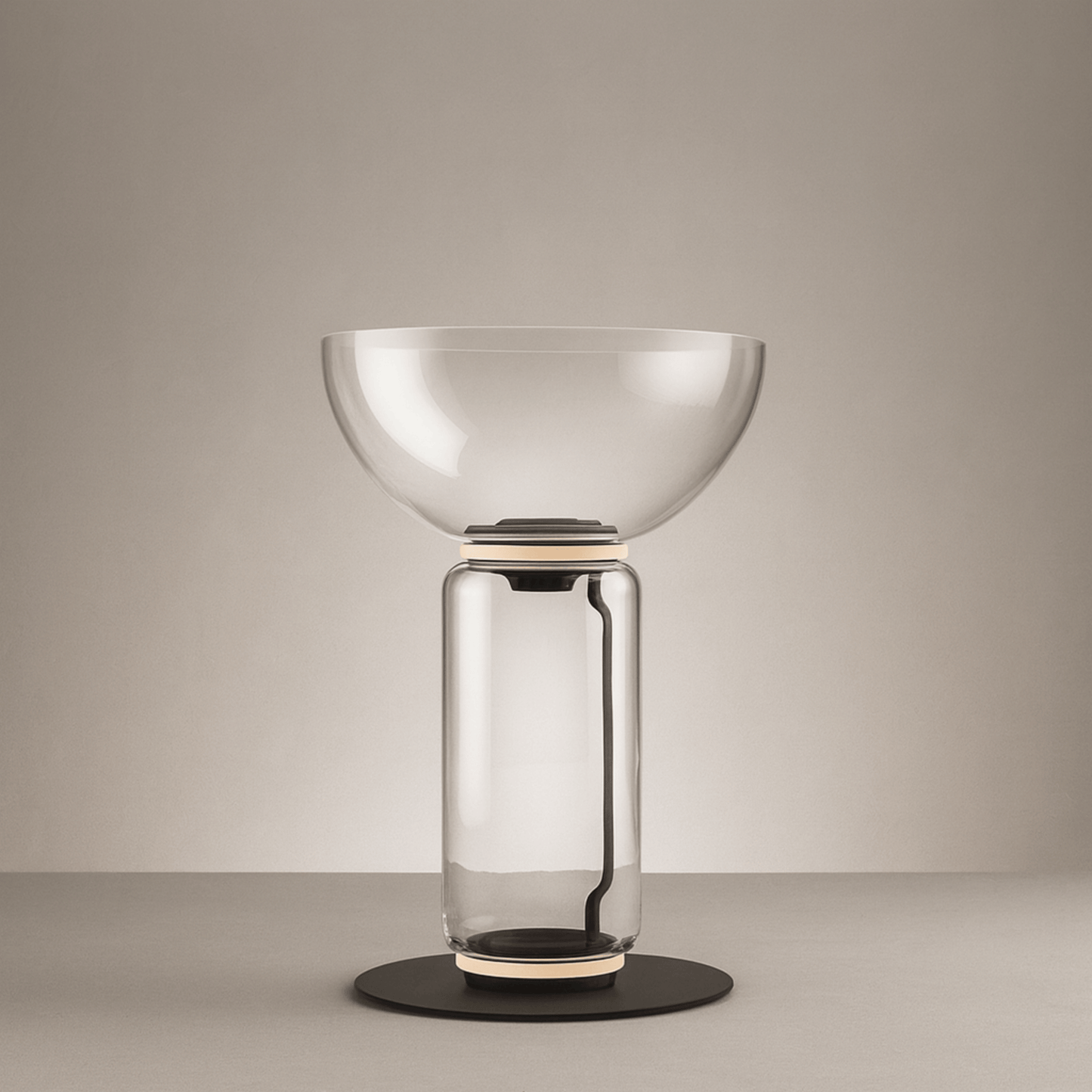 Modern glass table lamp with a beige background