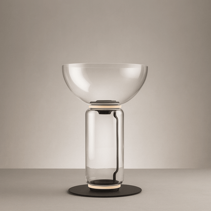 Modern glass table lamp with a beige background