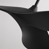 Close-up of a black propeller on a light gray background