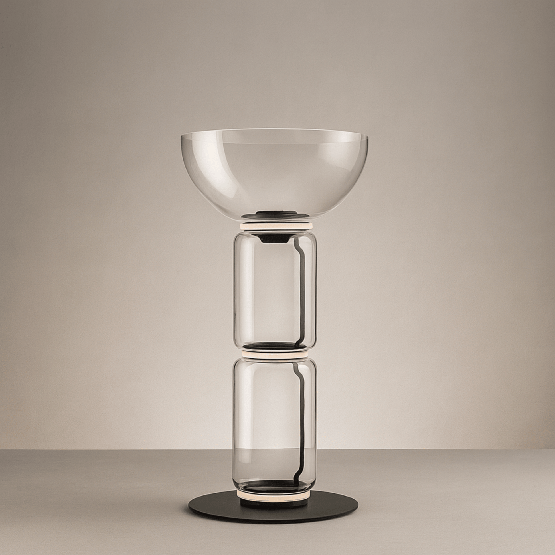 Modern glass table lamp with a beige background