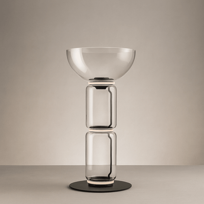 Modern glass table lamp with a beige background