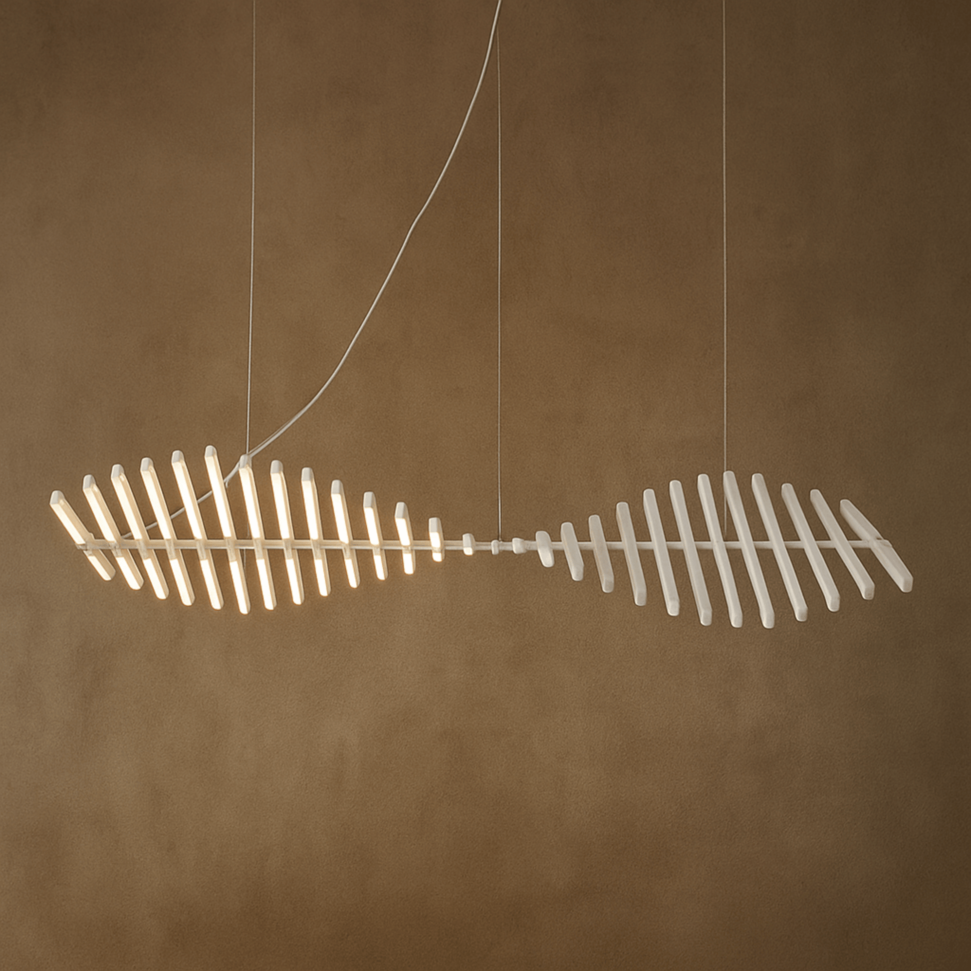 Fishtail-shaped light fixture on a brown background