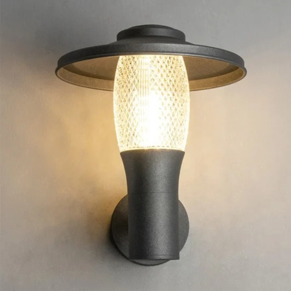 Sleek outdoor wall lamp with soft white glow and cylindrical glass shade