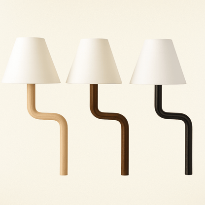 Three wall lamps with white shades on a beige background