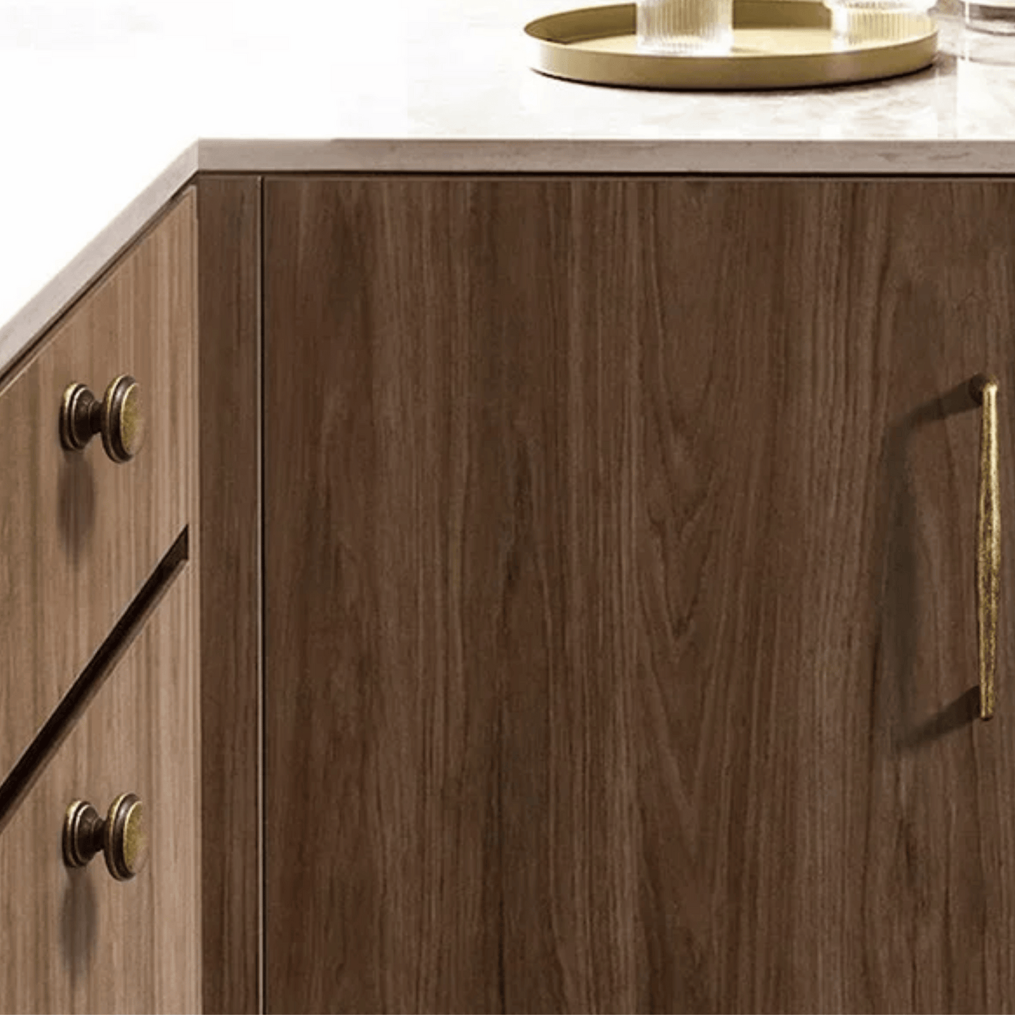 Wooden cabinet with gold handles on a white background