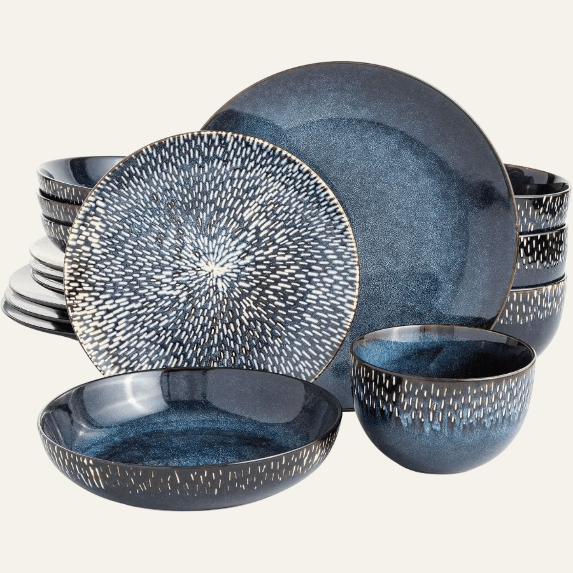 Set of blue ceramic dinnerware with textured design on a white background