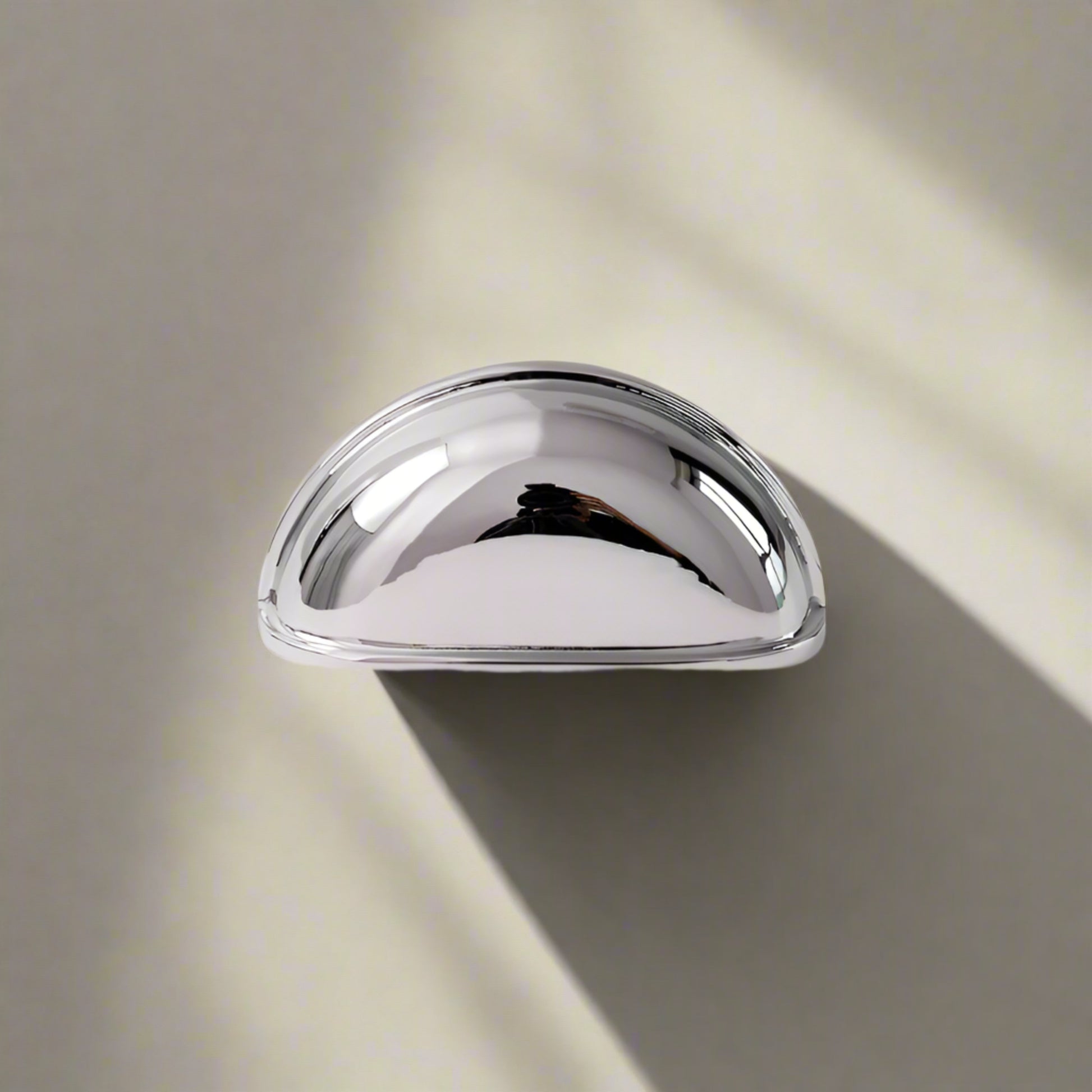 Chrome cabinet handle  on a white background