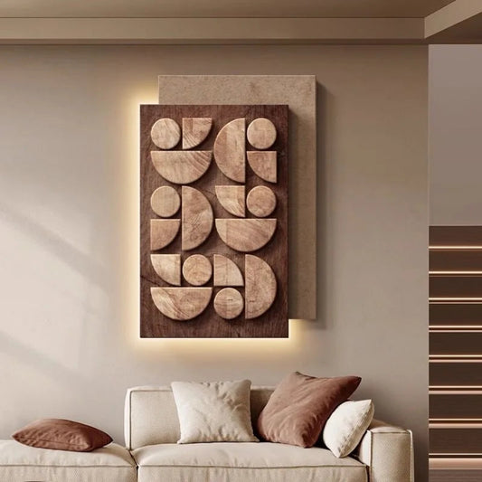 Wooden wall art with geometric shapes on a beige wall above a sofa.