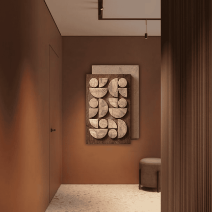 Decorative wall art in a room with brown walls and a door.