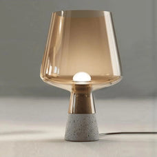 UrbanGlow Cement & Glass Table Lamp styled in a bedroom — modern interior by Baskoraa