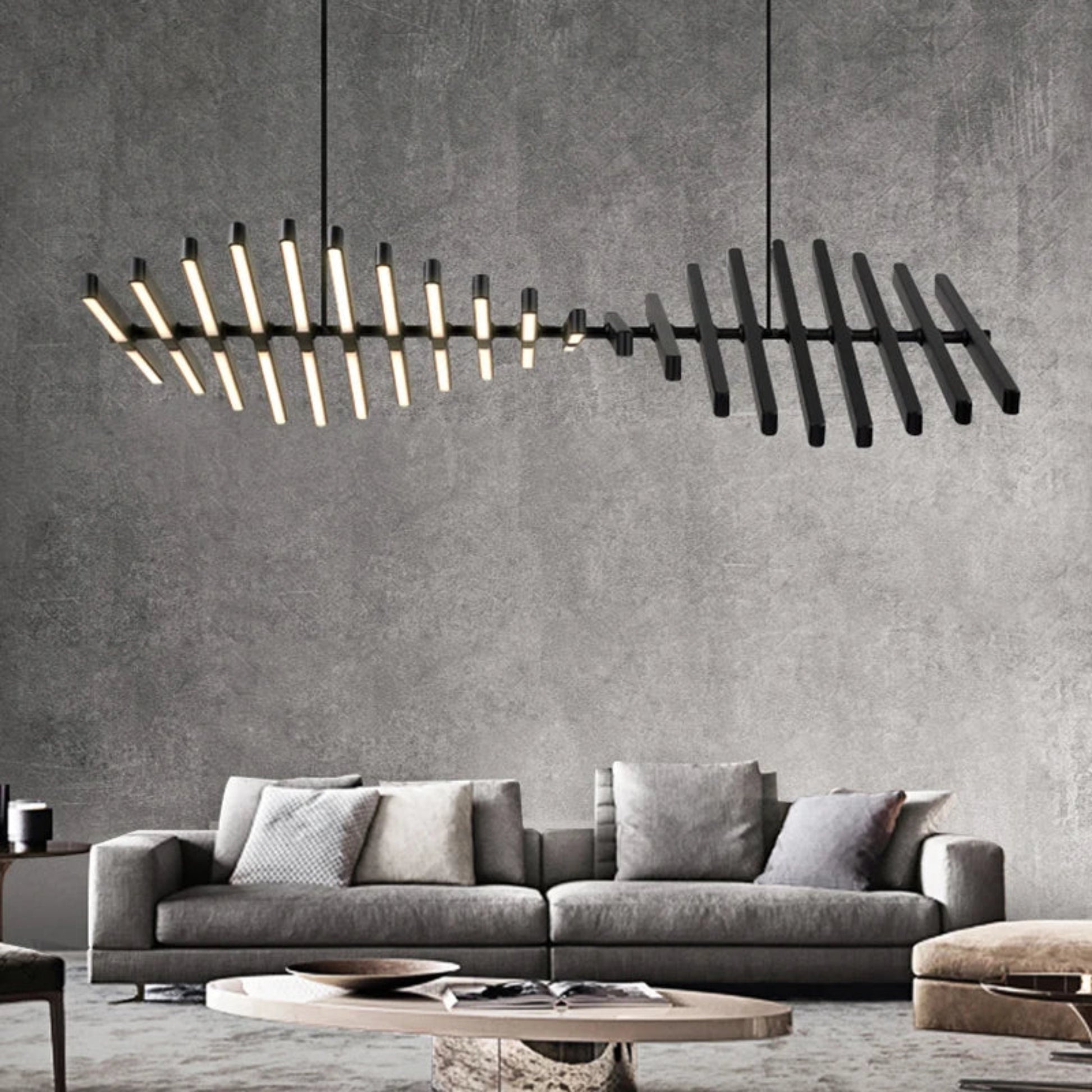 Contemporary designer chandelier with dynamic pattern of bars casting soft warm light in modern interior.