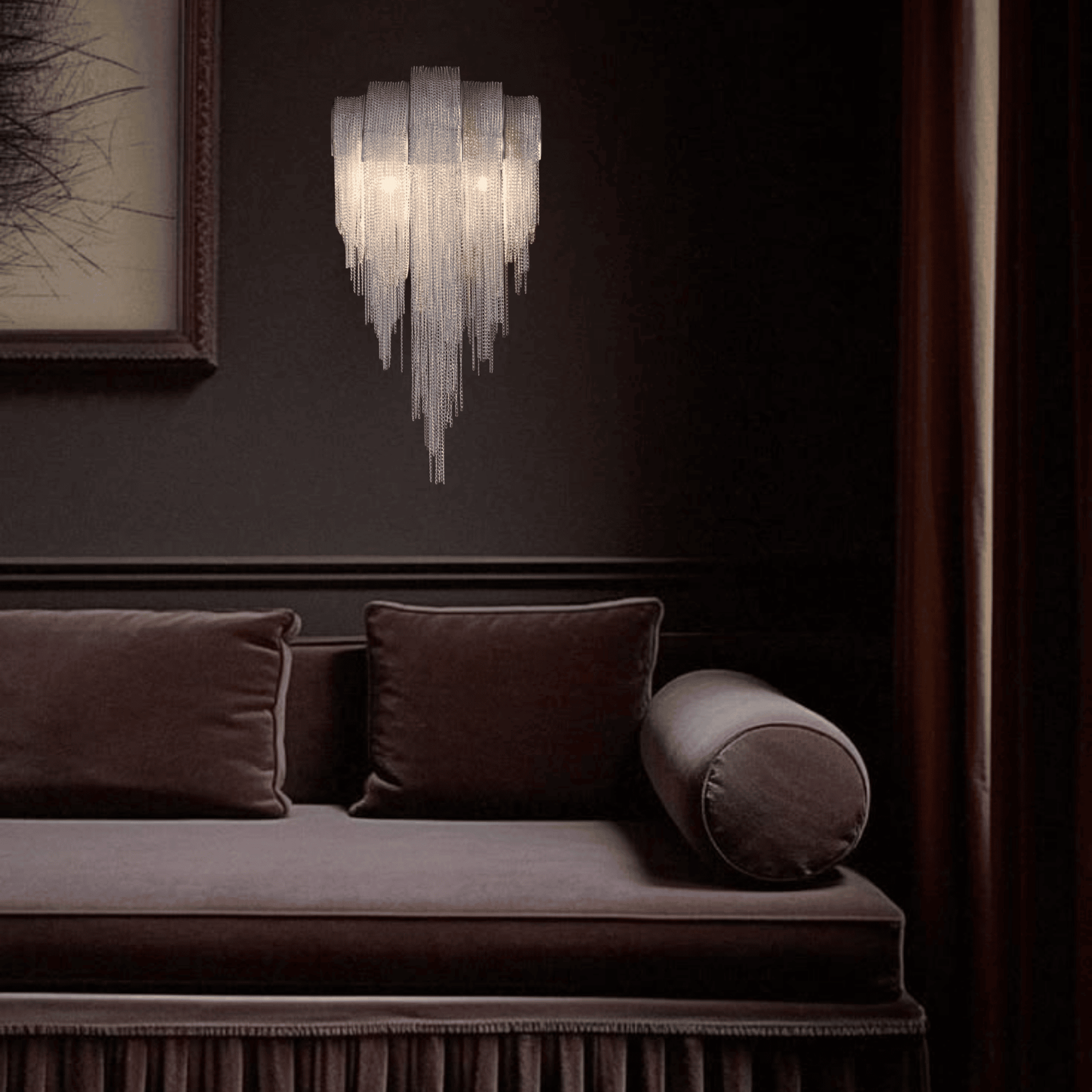 Decorative wall light fixture above a brown sofa with cushions.