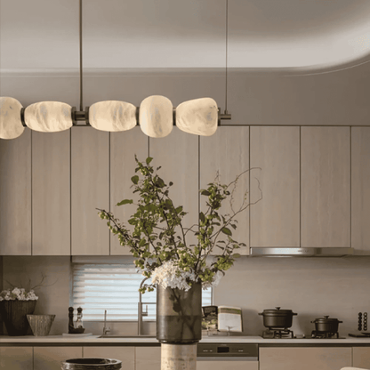 Modern kitchen with a vase of flowers on the counter