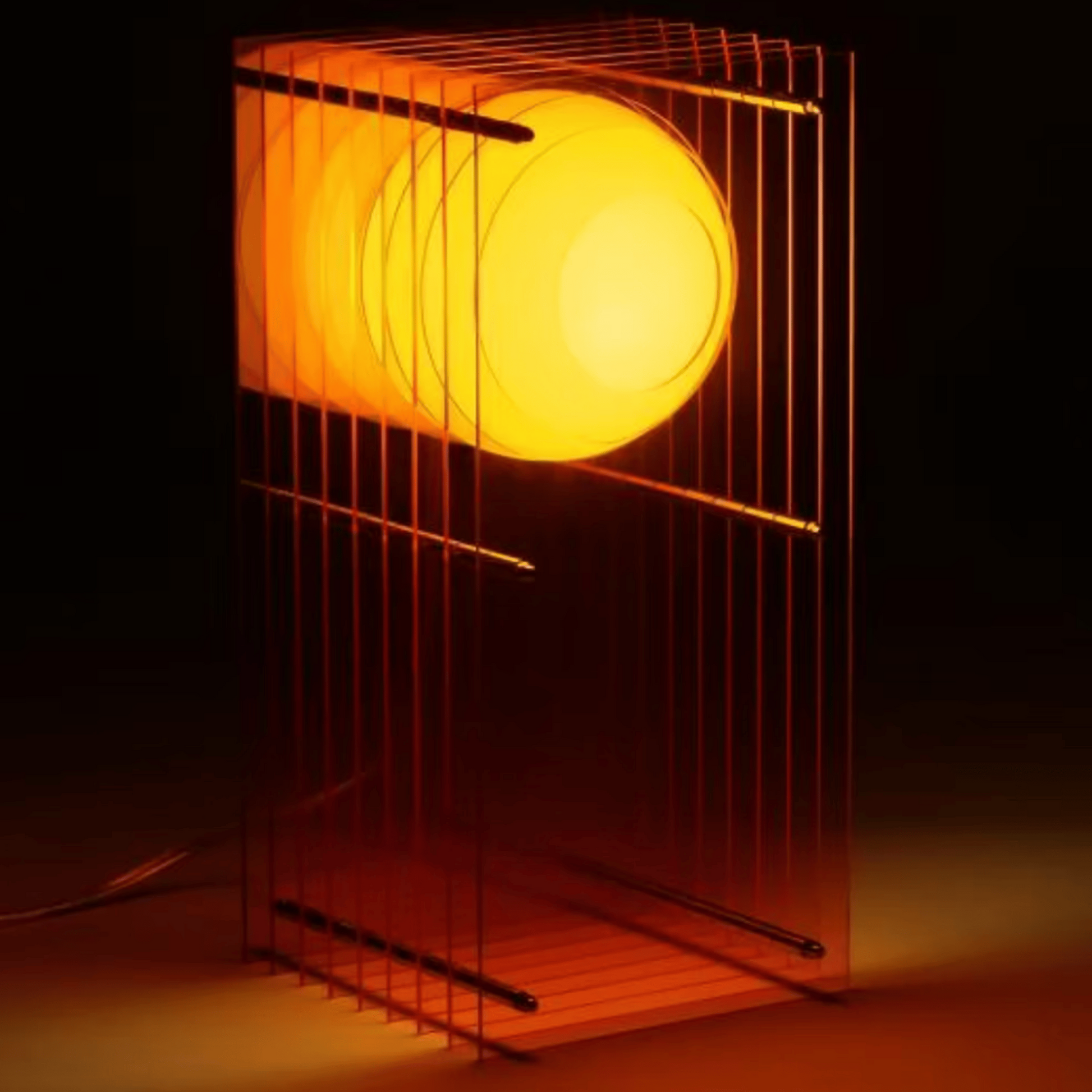 Cylindrical light fixture with a grid design on a dark background