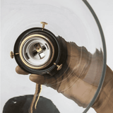 Close-up of Retro Glass Wall Sconce socket and brass detailing. Easy installation design for modern indoor lighting fixtures.