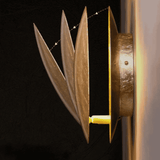 Side view of rotatable Moon Eclipse LED Wall Light showing adjustable bronze alloy plates. Modern lighting fixture for home interiors.