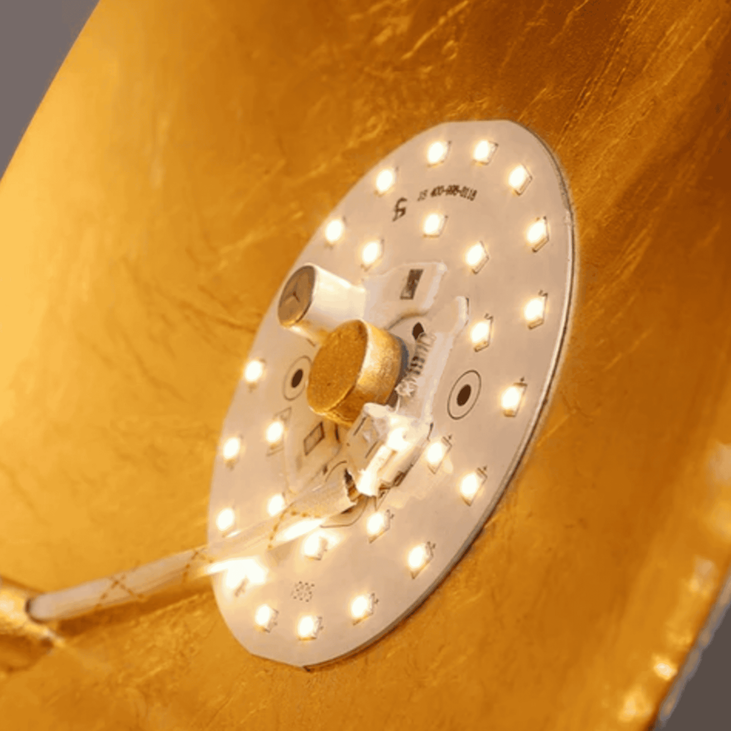Close-up of LED module in Moon Eclipse Wall Light. High-efficiency lighting with luminous flux up to 2000 for stylish home illumination.