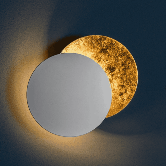 Silver and gold Moon Eclipse LED Wall Light with textured finish. Elegant sconce for contemporary interior lighting design.