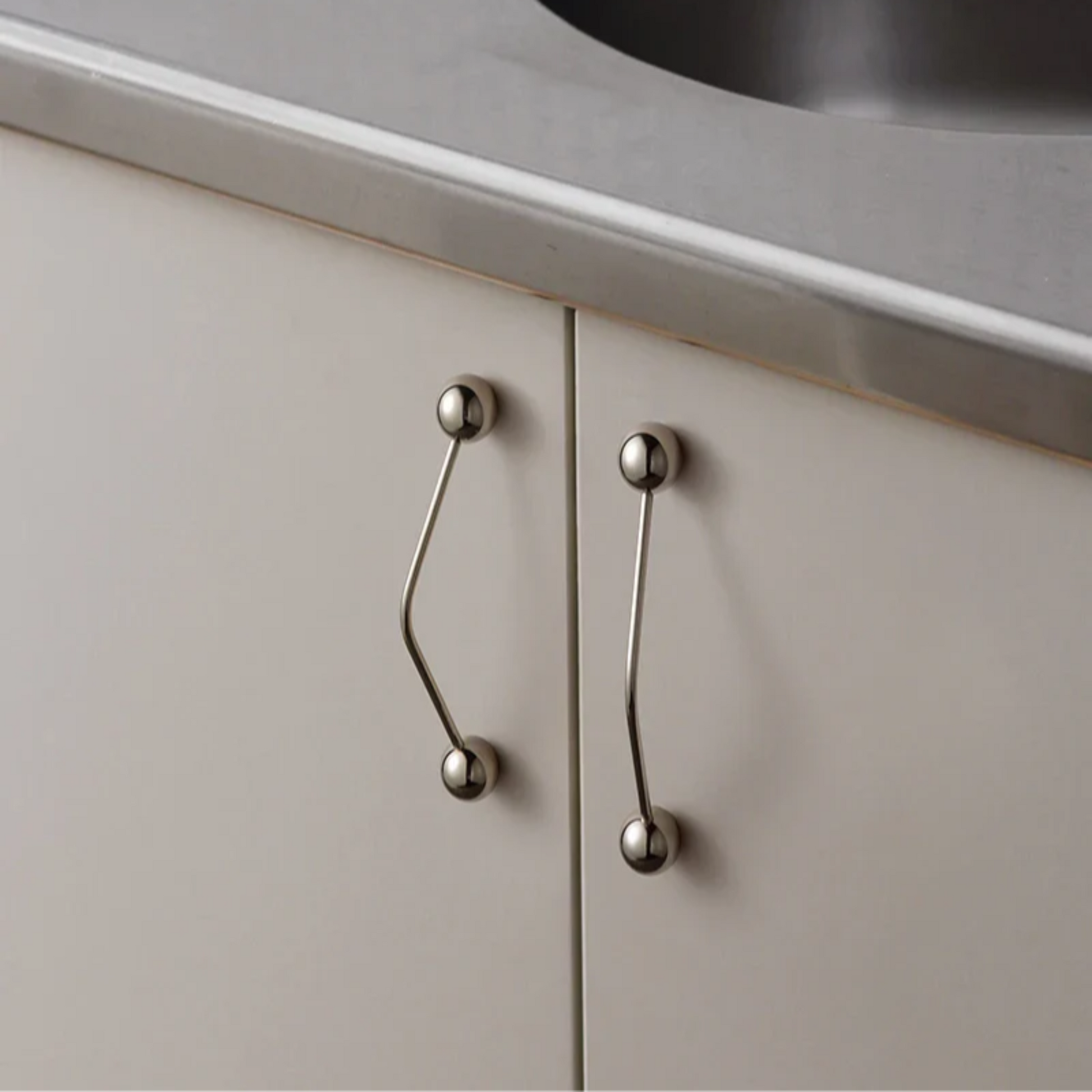 Cabinets with metallic handles 