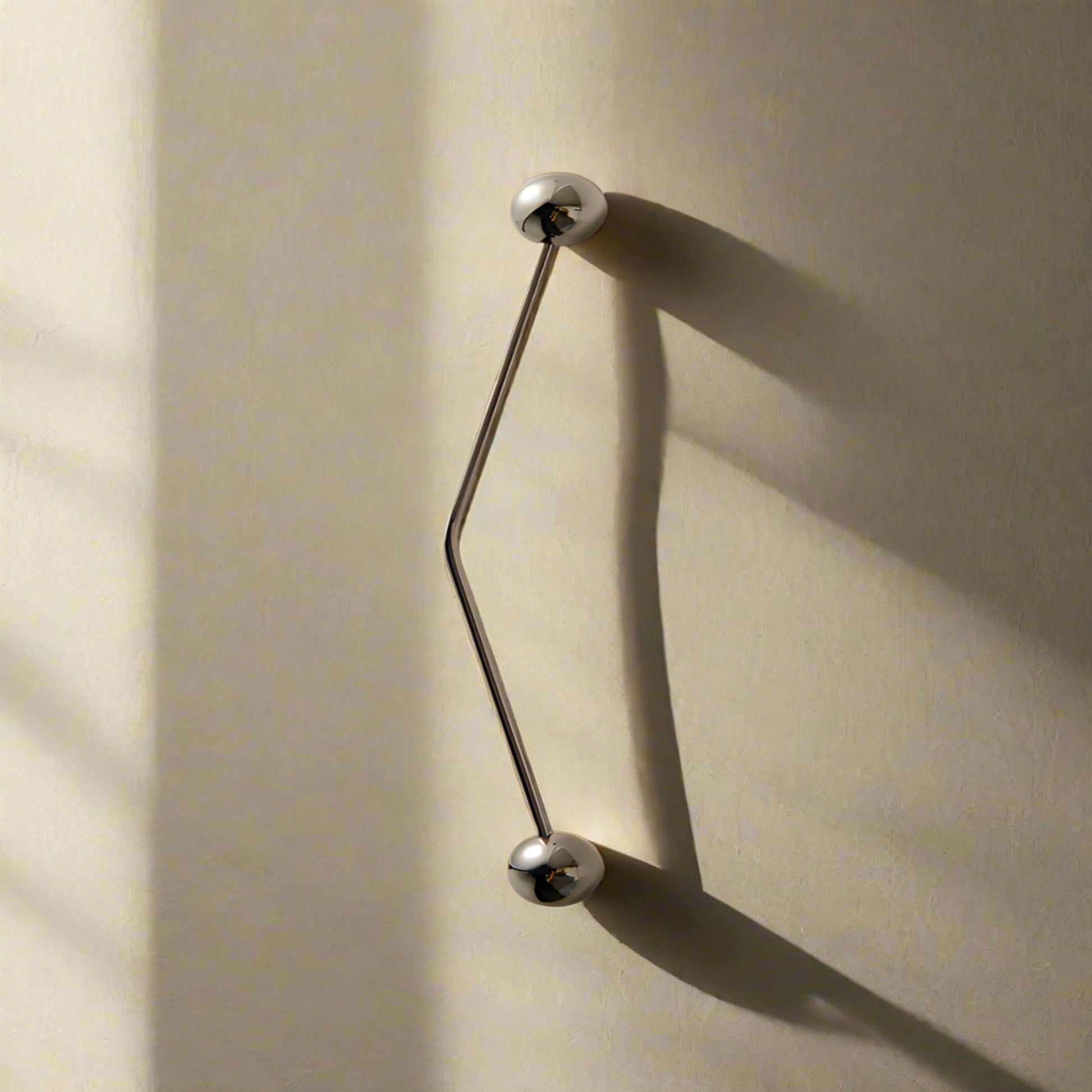 Metallic silver handles on beige backround