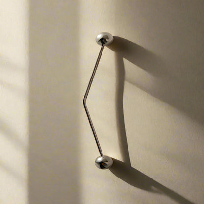 Metallic silver handles on beige backround